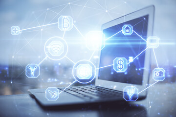 Computer on desktop with social network hologram. Double exposure. Concept of international people connections.