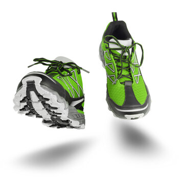 Green sport shoes running isolated on white