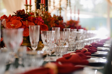 Romantically decorated table for a special event. Red decoration for celebration