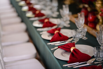 Romantically decorated table for a special event. Red decoration for celebration