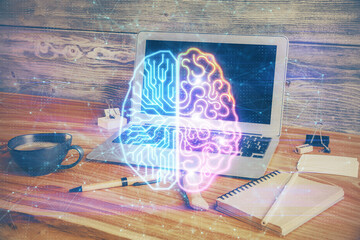 Double exposure of work space with computer and human brain drawing hologram. Brainstorm concept.