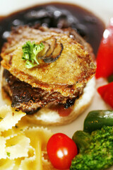Rib of beef with farfalle and vegetables