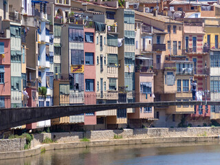 Fototapeta na wymiar Colorful facades of Girona City (Spain), View over Onyar river