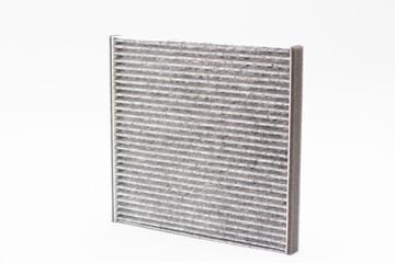 Carbon car air filter on white background