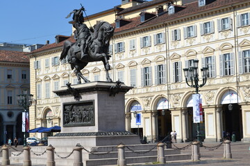 Fototapeta na wymiar TURIN, ITALY – AUGUST 13, 2013: The equestrian statue of Emmanuel Philibert at the center of the San Carlo Square in Turin, Italy on August 13, 2013