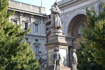 MILAN, ITALY – AUGUST 23, 2013: The Monument of Leonardo da Vinci by the side of the Theatre La...