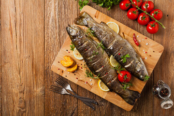 Grilled whole trout. Served with baked potatoes.