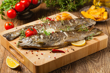 Grilled whole trout. Served with baked potatoes.