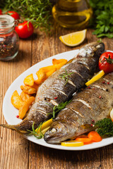 Grilled whole trout. Served with baked potatoes.