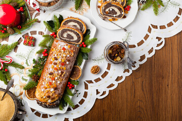 Poppy seed roulade in Christmas decoration. Served with coffee or tea.