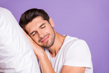 Close-up portrait of his he nice attractive sleepy brown-haired guy holding head on pillow drowsing...