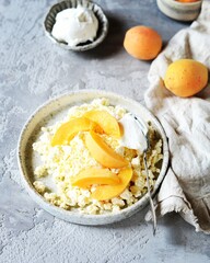 Fresh homemade cottage cheese with sour cream and apricots, breakfast, still life