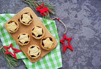 Step-by-step cooking of mince pies  traditional British Christmas shortcrust pastry cakes stuffed with dried fruits, nuts and apples.