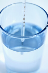 Thermometer in a glass of water