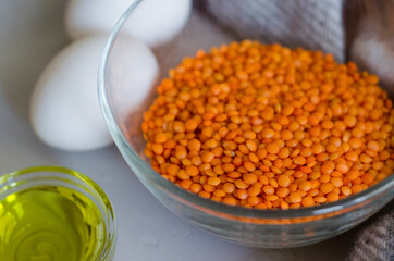 Red lentil close up in the bowl