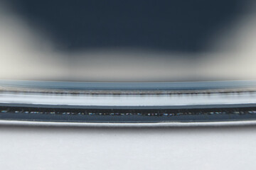 Macro detail with shallow focus of the outer border of a dvd disk