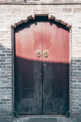 Detail shot of a Chinese wooden door.