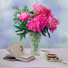 still life with flowers and a book