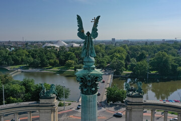 Obraz premium Heroes' Square or the Millennium Monument is the most important attraction of the city. Archangel Gabriel at the top of the Corinthian column. Tourist attraction Budapest, Hungary.