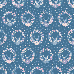 Blue pink floral wreaths with birds folk seamless vector pattern background for fabric, wallpaper, scrapbooking projects, or backgrounds.