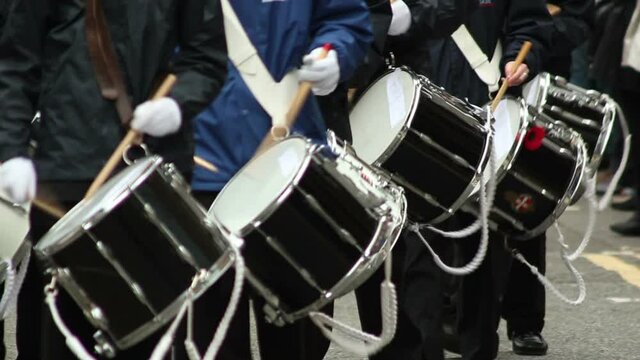 Marching Band with Drums walking during a parade. March on the streets with musical instruments. Stock Video Clip Footage