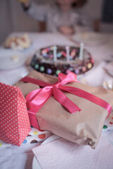 Fototapeta na wymiar children's birthday with a cake and presents