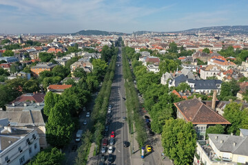 Fototapeta na wymiar There is a beautiful view from Heroes' Square to Andrássy Street. Drone photo. Budapest, Hungary.