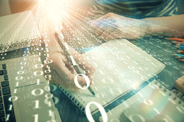 Double exposure of hands making notes with digital coding icons. Computer learning concept.