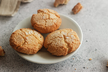 Tasty almond cookies with milk. Cookies on a plate