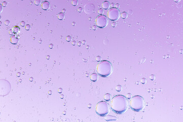 bubbles chemical liquid pink macro. chemical reaction in living organisms harmful to helium and methane in liquid states