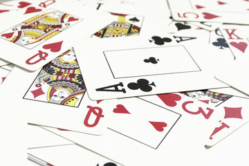 Mixed playing cards background. Assorted play cards backdrop. Many miscellaneous jumbled playing...