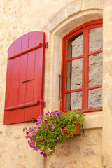 Fototapeta na wymiar Typical French window with shutters