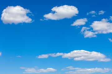 Fototapeta na wymiar Blue sky with clouds on sunny day