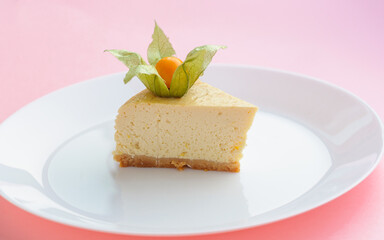 Slice of New York Cheesecake on white plate