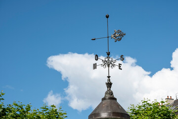 Fototapeta na wymiar weather vane on a monument in Geneva Switzerland
