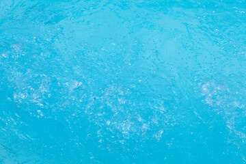 Sparkling swimming pool water in closeup