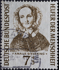 GERMANY - CIRCA 1955:This postage stamp shows the portrait of the philanthropist Amalie Sieveking...