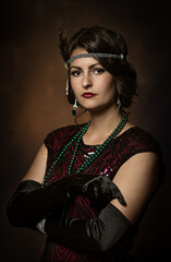 Elegant young lady with pearl necklace 1920s years