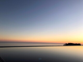 Fototapeta premium blue sky at sunset with the sea