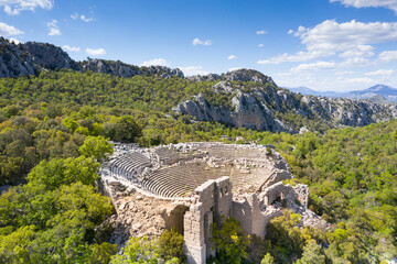 Fototapeta premium Termessos ancient city the amphitheatre. Termessos is one of Antalya -Turkey's most outstanding archaeological sites. Despite the long siege, Alexander the Great could not capture the ancient city. 