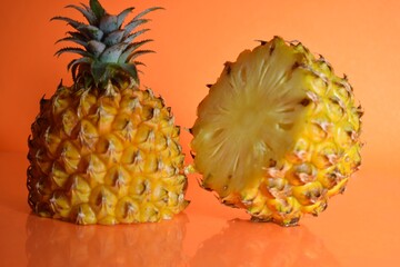 pineapple on orange color background