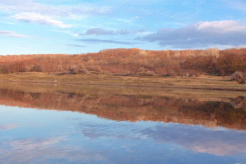 Autumnal Scenery with Nature reflection in the Lake  . Early Morning LAndscape in the Fall Season 