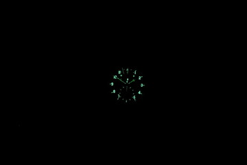 Vintage aviation cabin clock dial glow in the dark on black background
