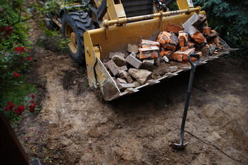 Fototapeta na wymiar old bricks removed by an excavator