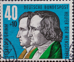 GERMANY - CIRCA 1959: a postage stamp printed in Germany showing a Portrait of the Brothers Grimm...