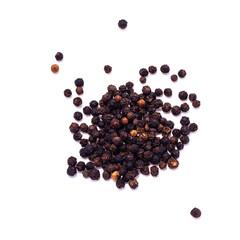 A handful of dried Black pepper solated on white
