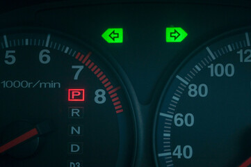 Black speedometer from a close-up car and symbol inside the screen