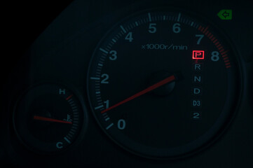 Black speedometer from a close-up car and symbol inside the screen