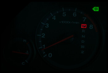 Black speedometer from a close-up car and symbol inside the screen