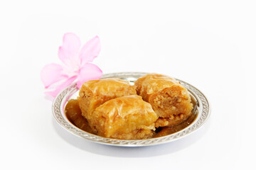 traditional Eastern Turkish sweet baklava on a decorative plate